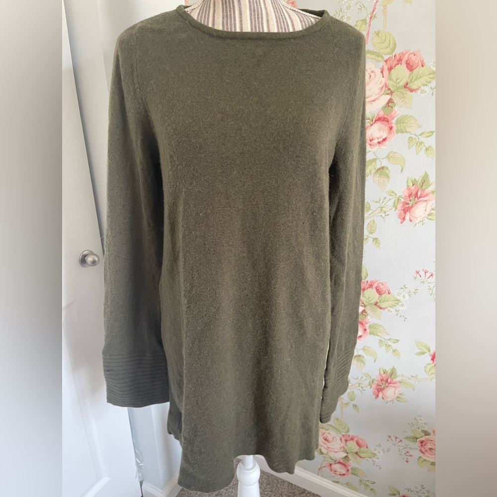 Cute tunic style sweater with detailed bell sleeves